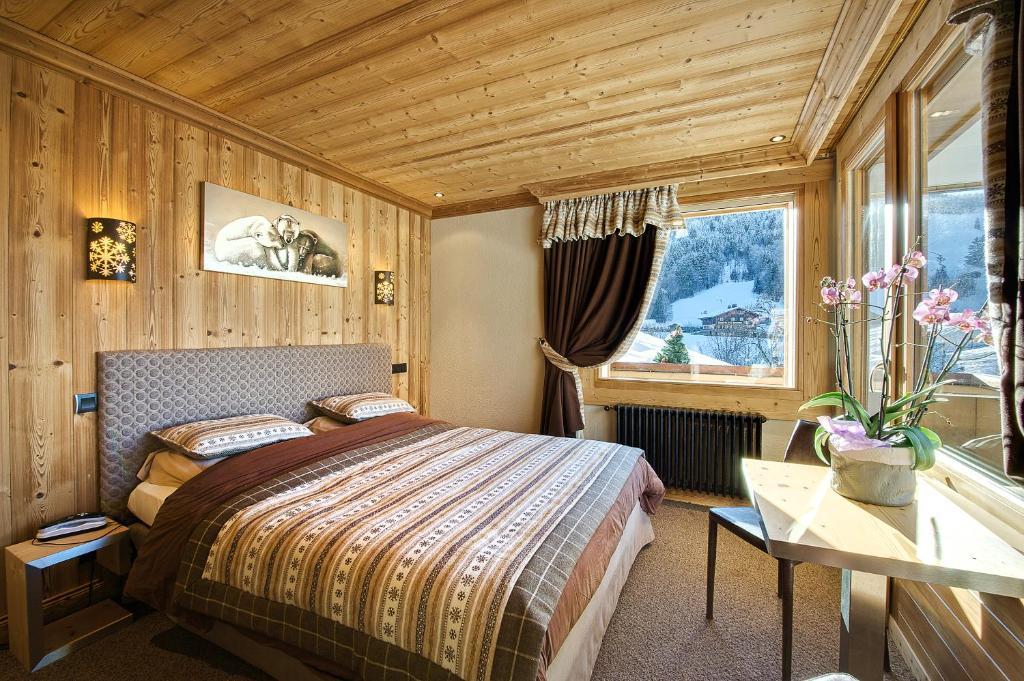 Hotel-Chalet Les Ecureuils Restaurant, Piscine, Garage Le Grand-Bornand Rom bilde